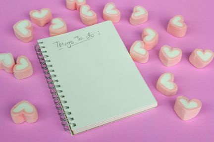 91515022 - marshmallow heart shape with love concept on pink background